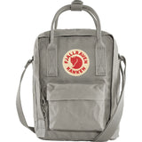 Navy Fjallraven Kanken Sling crossbody bag with adjustable strap and compact design, ideal for carrying essentials.