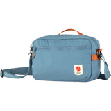Fjallraven High Coast Crossbody bag in patina green, showcasing its compact design and adjustable strap.