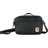 Fjallraven High Coast Crossbody bag in patina green, showcasing its compact design and adjustable strap for everyday use.