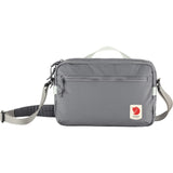 Fjallraven High Coast Crossbody bag in patina green, lightweight design with adjustable strap, made for everyday carrying.