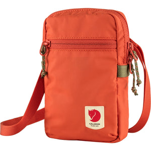 Fjallraven High Coast Pocket crossbody bag in Rowan Red, compact bag with adjustable strap and front zipper pocket.