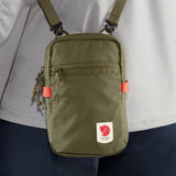 Fjallraven High Coast Pocket crossbody bag in Rowan Red, made of durable fabric with a sleek, compact design and adjustable strap.