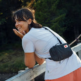 Fjallraven High Coast Pocket crossbody bag in Rowan Red with adjustable strap and multiple compartments.