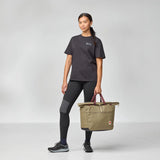 Fjallraven High Coast Tote 30 in beige with leather handles, showing its spacious fabric design and sturdy construction.