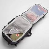 Fjallraven Farden Carry-on Pack travel backpack in dark green with multiple compartments and adjustable straps.