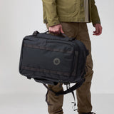 Fjallraven Farden Carry-on Pack travel backpack with multiple compartments and padded shoulder straps, black color.
