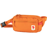 Green Fjallraven High Coast Hip Pack, compact waist pack with adjustable straps and multiple compartments for outdoor essentials.