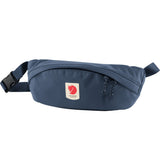 Fjallraven Ulvo Hip Pack Medium in mountain blue, a compact waist pack with adjustable strap and multiple compartments.