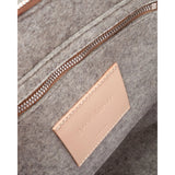 Graf Lantz Bedford Merino Wool Backpack in granite with adjustable straps, front pocket, and natural wool texture.