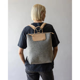 Graf Lantz Bedford Merino Wool Backpack in granite color with leather accents, showing the stylish, textured exterior and adjustable straps.