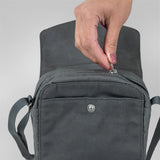 Greenland Pocket Bag by Fjallraven in green, crossbody style with front pocket and adjustable strap, made of durable fabric.