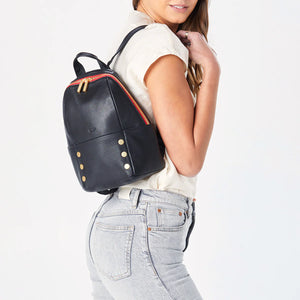 Hammitt Hunter Med Backpack in black leather with adjustable straps and multiple compartments, front pocket, and sleek design.