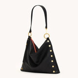 Black Hammitt Kyle LRG handbag with brushed gold hardware, featuring sleek design and structured shape.