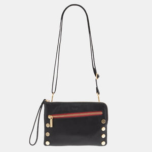 Hammitt Nash Small handbag in black brushed gold with red zipper, featuring sleek design and compact size.