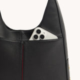 Hammitt Tim Med wallet with multiple card slots and zipper closure, shown in close-up detail on a neutral background.