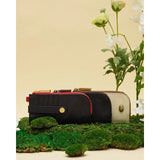 Black Hammitt 210 East handbag with gunmetal hardware, featuring sleek design and top handles.