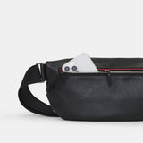 Hammitt Charles Crossbody Large bag in black leather with silver hardware and adjustable strap on a neutral background.