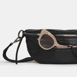 Hammitt Charles Crossbody Med bag with brown leather strap and sleek design, featuring metal hardware and spacious interior.