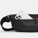 Hammitt Charles Crossbody Med bag in black leather with adjustable strap and silver hardware, showcasing a compact, stylish design.