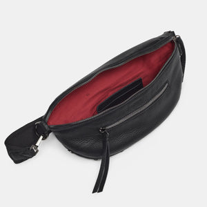 Hammitt Charles Crossbody Med bag in leather with adjustable strap and silver hardware, displayed on a plain background.