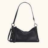 Hammitt Kyle SML crossbody bag in sleek leather with adjustable strap, featuring minimalist design and metal hardware.