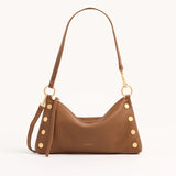 Black Hammitt Kyle SML crossbody bag with brushed gold hardware, compact design, and adjustable strap.