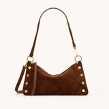 Black Hammitt Kyle SML crossbody bag with brushed gold hardware, featuring a compact design and adjustable strap.