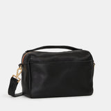 Black Hammitt Evan Crossbody Sml bag with brushed gold hardware and red zipper, stylish small crossbody bag for everyday use.
