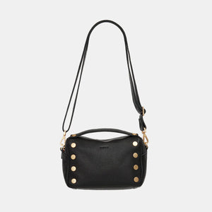 Black Hammitt Evan Crossbody Sml bag with brushed gold hardware and red zipper, stylish compact crossbody bag.