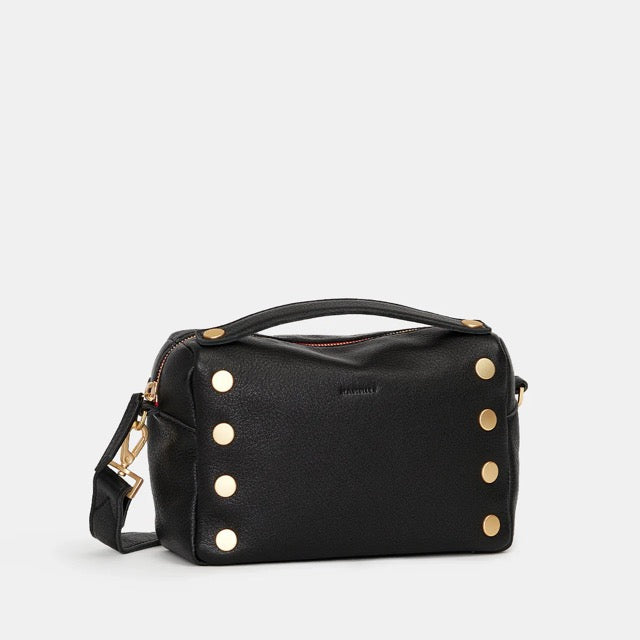 Black Hammitt Evan Crossbody Sml bag with brushed gold accents and red zipper, stylish compact crossbody bag for everyday use.