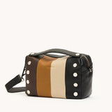 Black Hammitt Evan crossbody bag with gold brushed hardware and red zipper, compact design, stylish for everyday use.