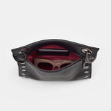 Black Hammitt Tony Med crossbody bag with sleek design and adjustable strap, featuring silver hardware and minimalist style.