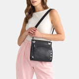 Hammitt Tony Med black crossbody bag with adjustable strap and silver hardware, made of premium leather.