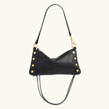 Black Hammitt Kyle Med handbag with brushed gold hardware and red zip, showcasing a stylish, compact leather design.
