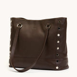 Hammitt Anderson Revival LRG handbag in tan leather with silver hardware, featuring a structured shape and top handle.