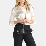 Black Hammitt VIP Mobile purse with zippered compartment and sleek design, showcasing the stylish accessory.