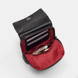 Hammitt VIP Mobile purse with sleek design, featuring a black leather exterior and compact shape for stylish carrying.