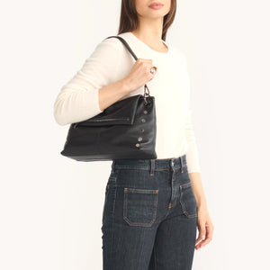 Hammitt VIP Grand purse with sleek leather design and silver hardware, showcasing its elegant and spacious style.