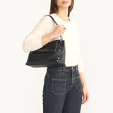 Hammitt VIP Grand purse with sleek leather design and silver hardware, showcasing its elegant and spacious style.