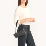 Black Hammitt Nash Pochette purse with gunmetal hardware, featuring a sleek and compact design for stylish everyday use.