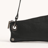 Hammitt Nash Pochette purse with sleek leather design and metal accents, showcasing its compact, stylish appearance.