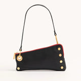 Black Hammitt Nash Pochette purse with gunmetal hardware, featuring a sleek, compact design and smooth leather finish.