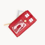 Chili red Hammitt 210 West wallet with gold accents, showcasing the stylish leather wallet with multiple card slots and compact design.