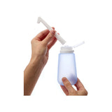 Humangear BidetToob portable travel bidet with ergonomic design and water nozzle for personal hygiene.