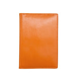 ILI personalized leather passport case in papaya color, featuring a sleek design and secure closure for travel essentials.
