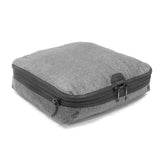 Medium charcoal Peak Design Packing Cubes by Index Urban, showing organized interior with multiple compartments for travel storage.