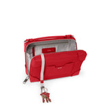 Tumi Voyageur Dey Trunk Crossbody bag in black with adjustable strap and multiple compartments for travel and everyday use.