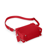 Tumi Voyageur Dey Trunk Crossbody bag in black with adjustable strap and multiple compartments