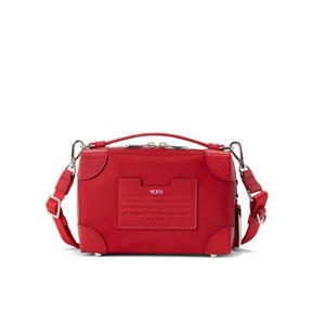 Tumi Voyageur Dey Trunk crossbody bag in black with adjustable strap and multiple compartments, designed for urban travel.