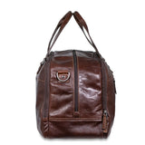Jack Georges classic leather duffel bag showing sturdy handles and spacious main compartment for travel and weekend trips.